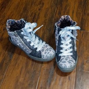 Steve Madden girl's high top glitter sneakers.
